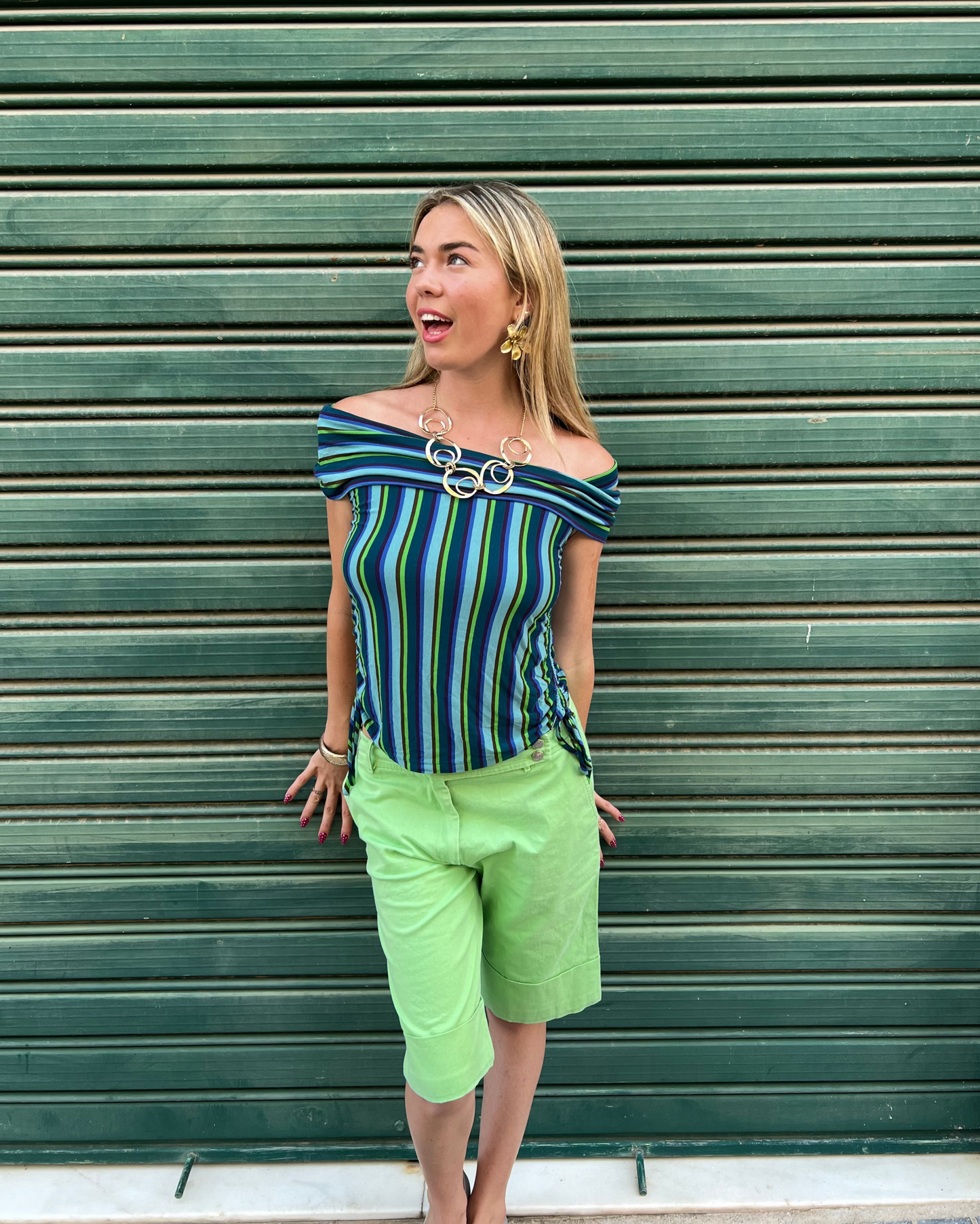 Green capri style shorts