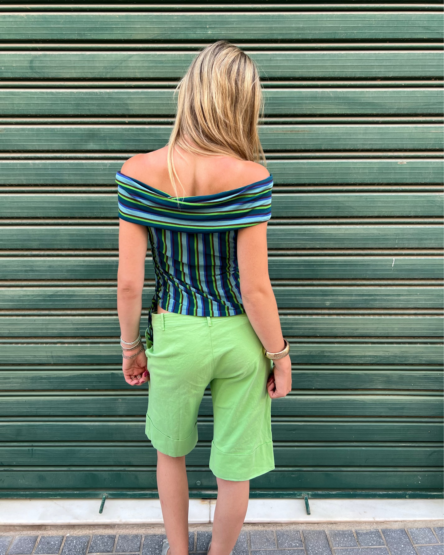 Green capri style shorts