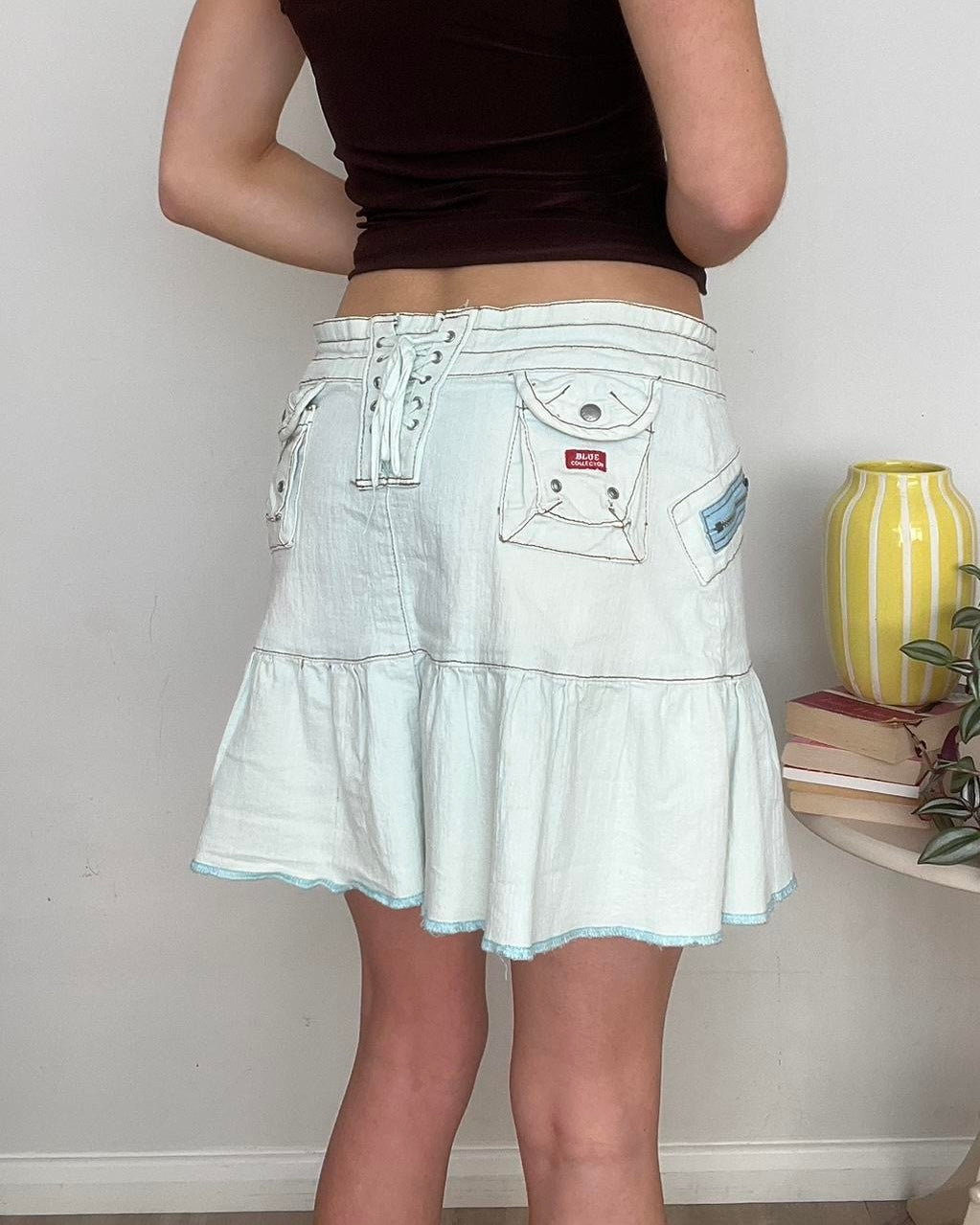 light wash denim pleated mini skirt