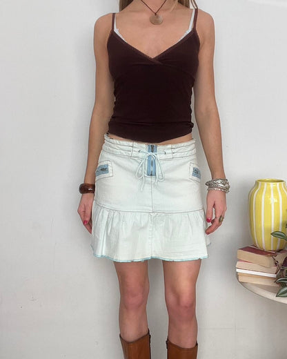 light wash denim pleated mini skirt