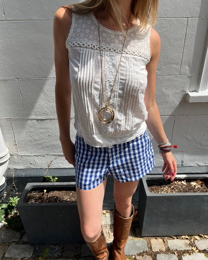 Blue and white gingham mini shorts
