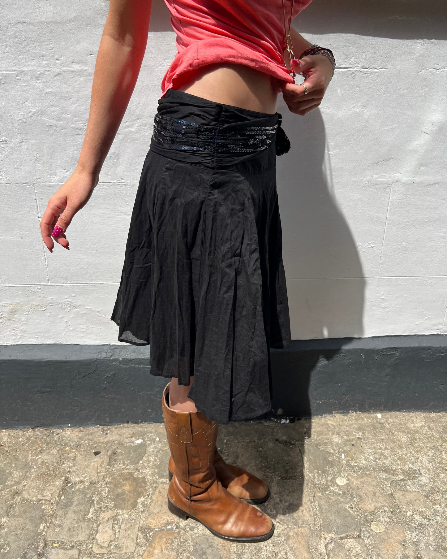 Black midi skirt with sequin belt