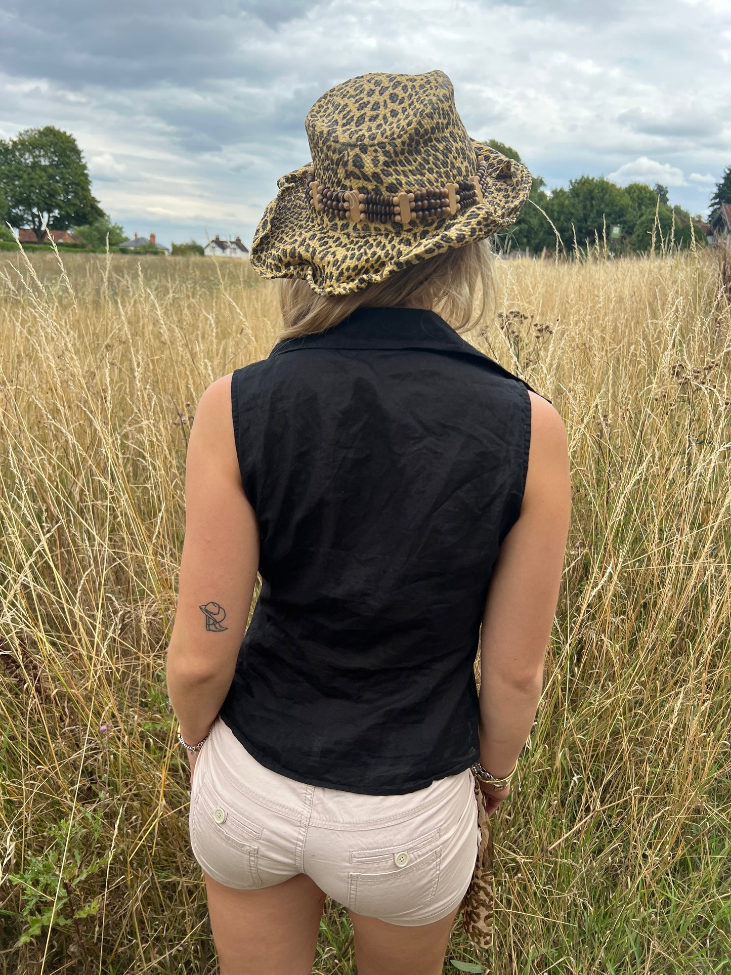 Black sleeveless ruffle blouse
