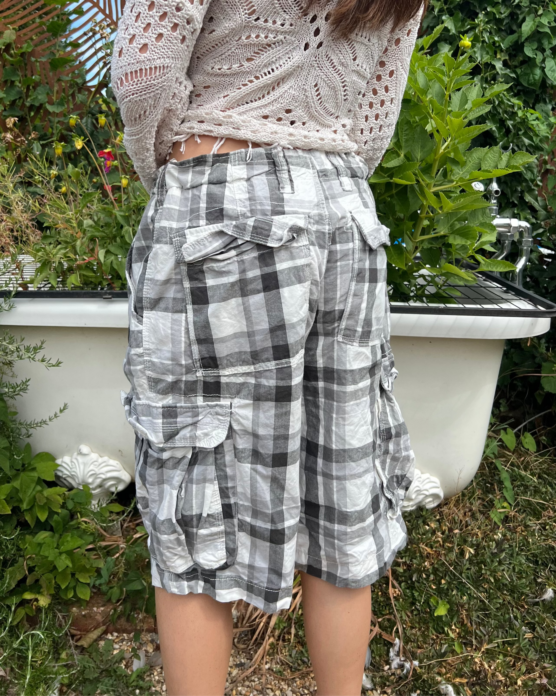 Oversized grey and white plaid cargo shorts